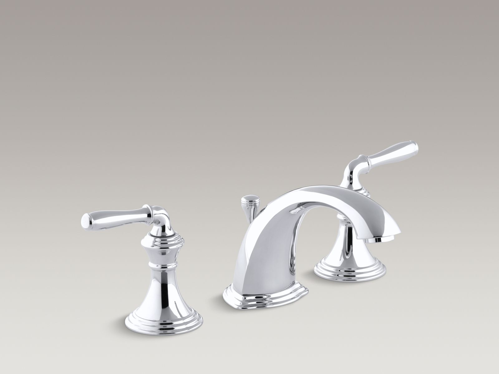 Devonshire® widespread bathroom sink faucet with lever handles, flexible connections and pop-up drain