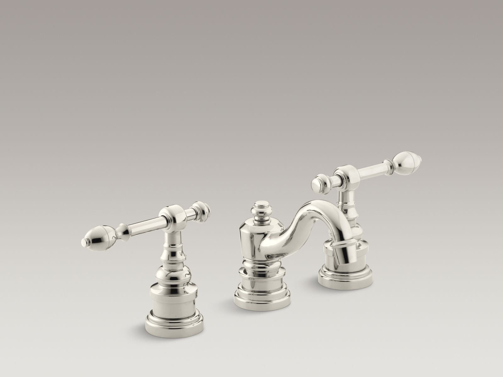 IV Georges Brass® widespread bathroom sink faucet with lever handles