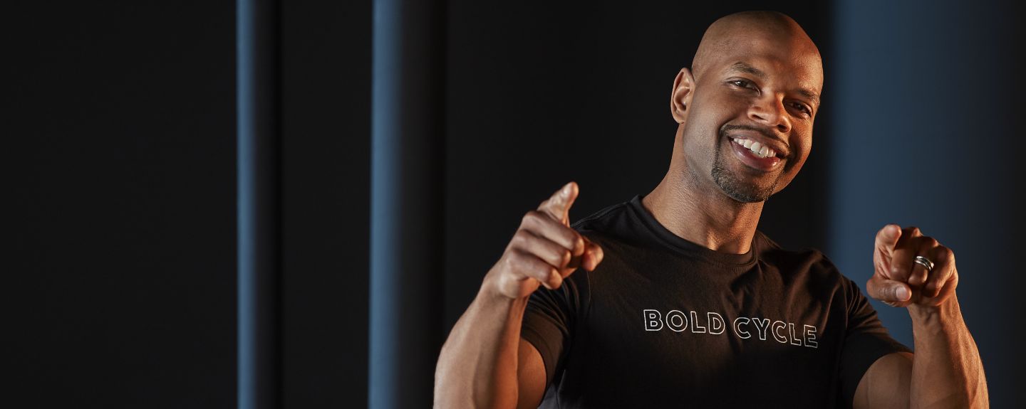 Rodney Ellison, an HR generalist at Kohler Co., looks and points at the camera.