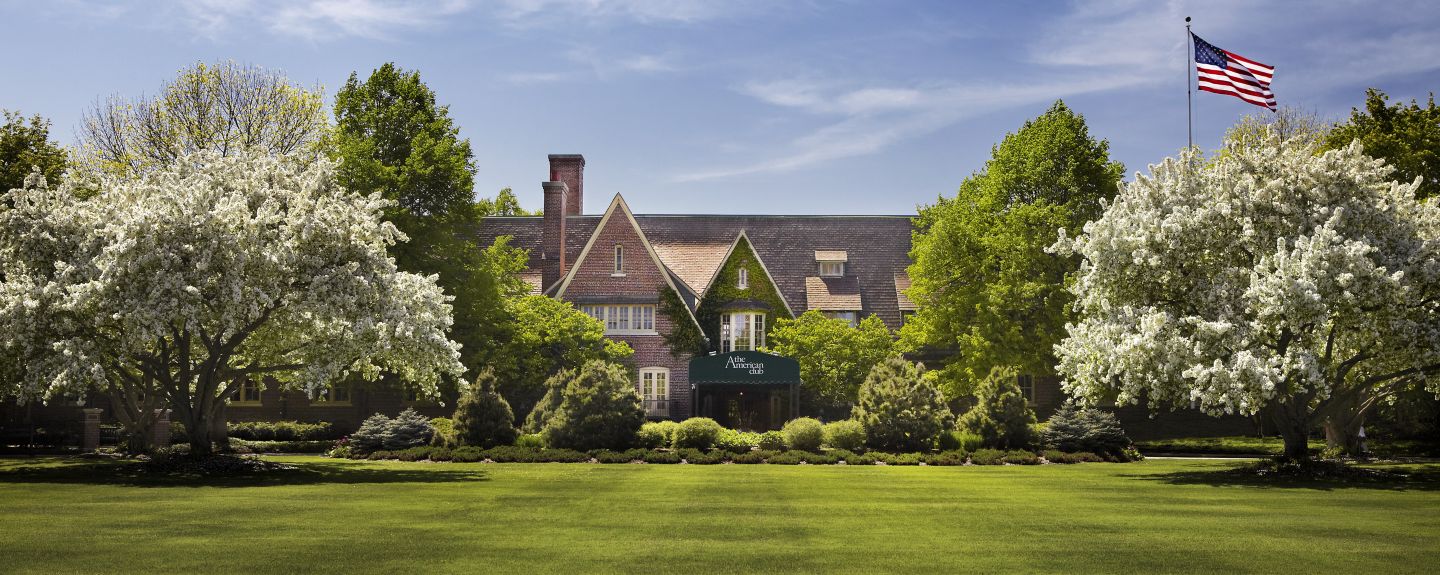 View of The American Club entrance on a beautiful spring day