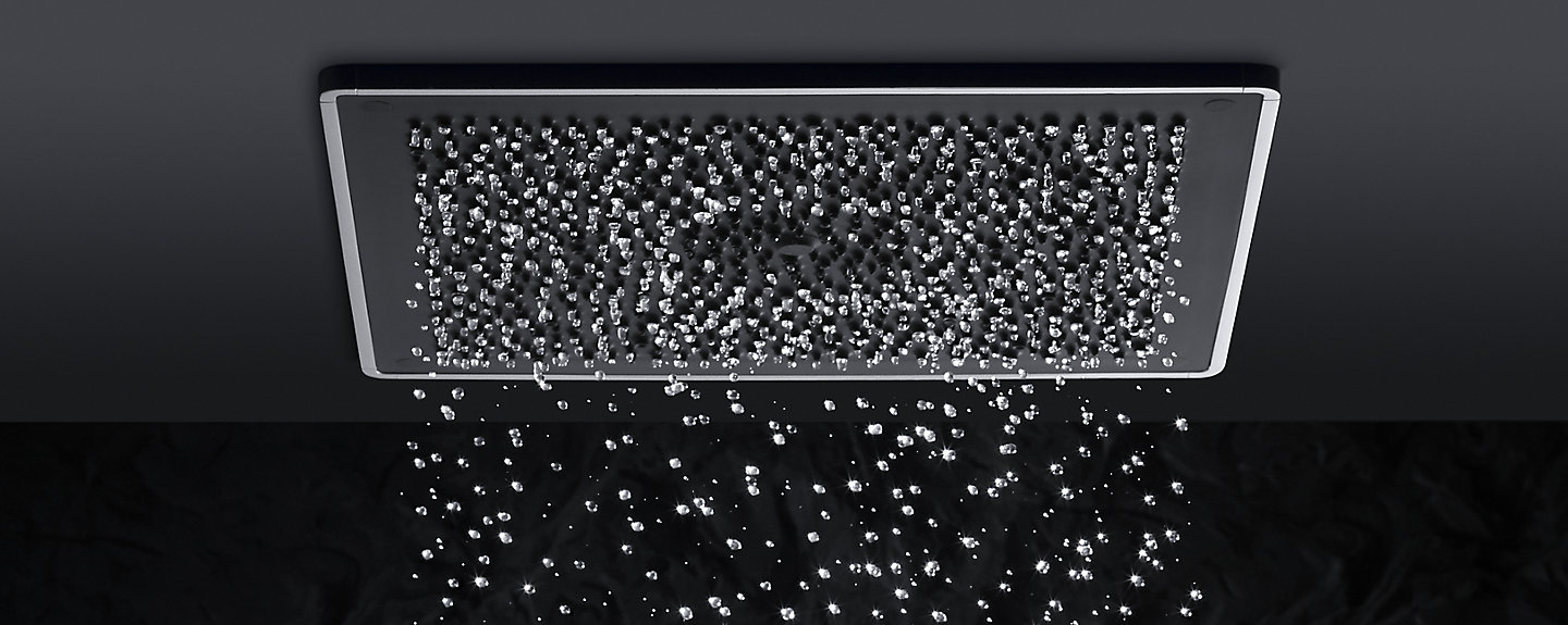 Water drops down from a Kohler rainhead shower head