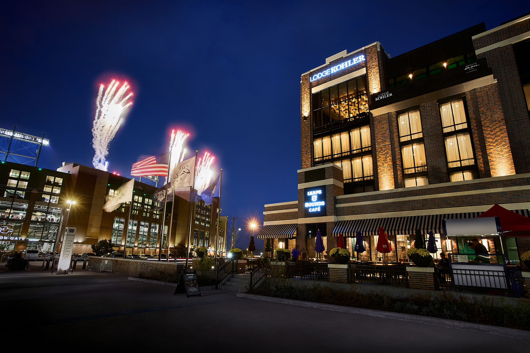 Evening view of Lodge Kohler with a festive display of fireworks.