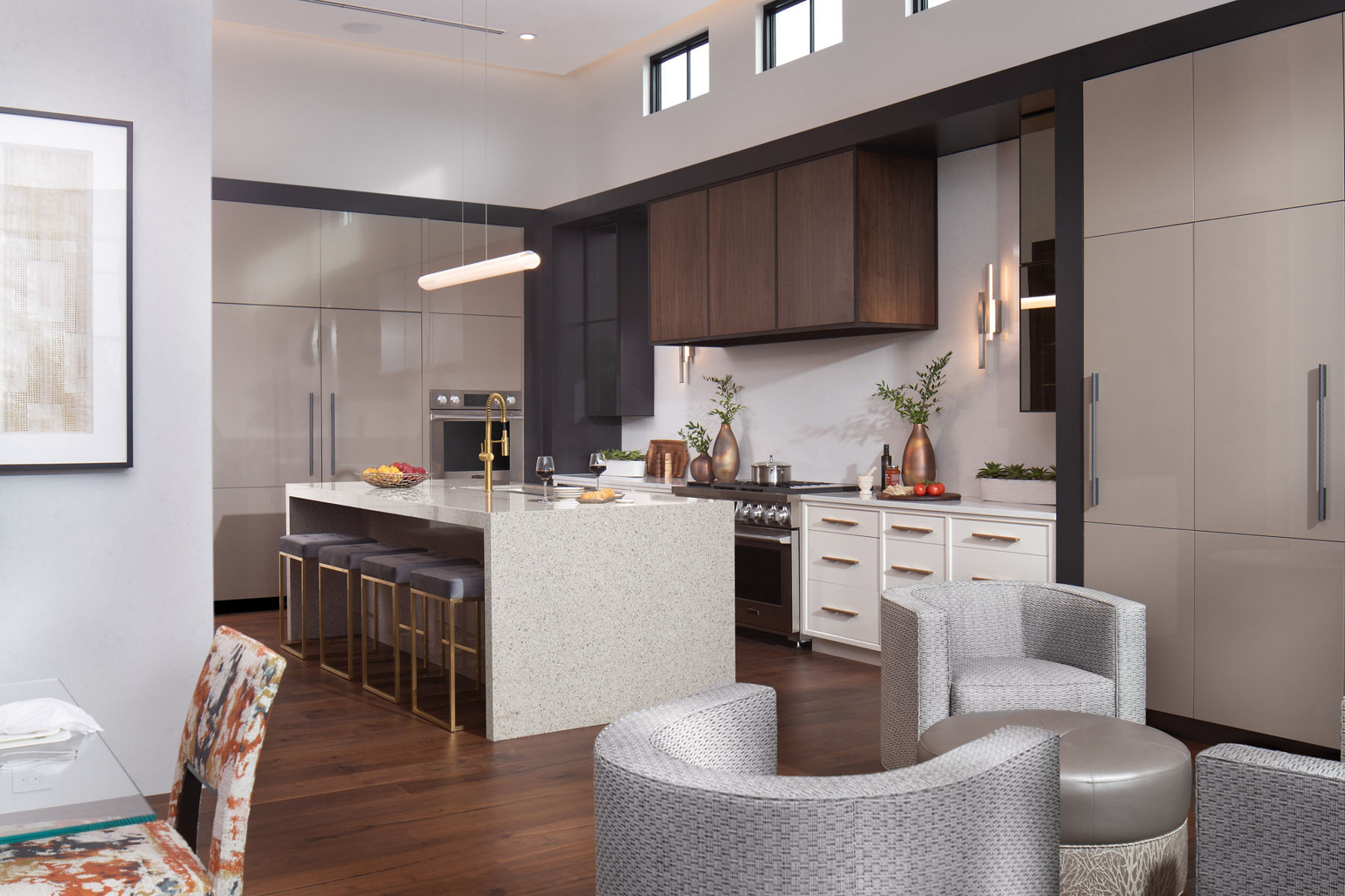 Daylight in large modern kitchen featuring large island and Vibrant Brushed Moderne Brass accessories.