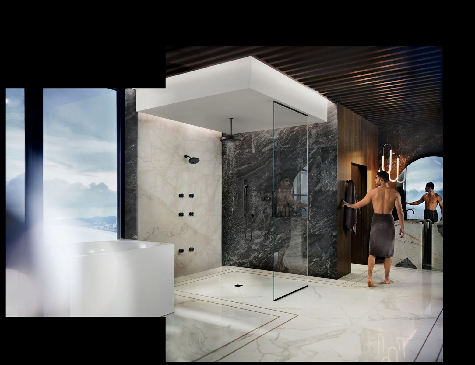 Un homme allume sa douche à effet de pluie avec un jet corporel Anthem de KOHLER, dans une salle de bain penthouse avec des fenêtres allant du sol au plafond, un plancher en marbre blanc et une grande douche de plain-pied en marbre blanc.