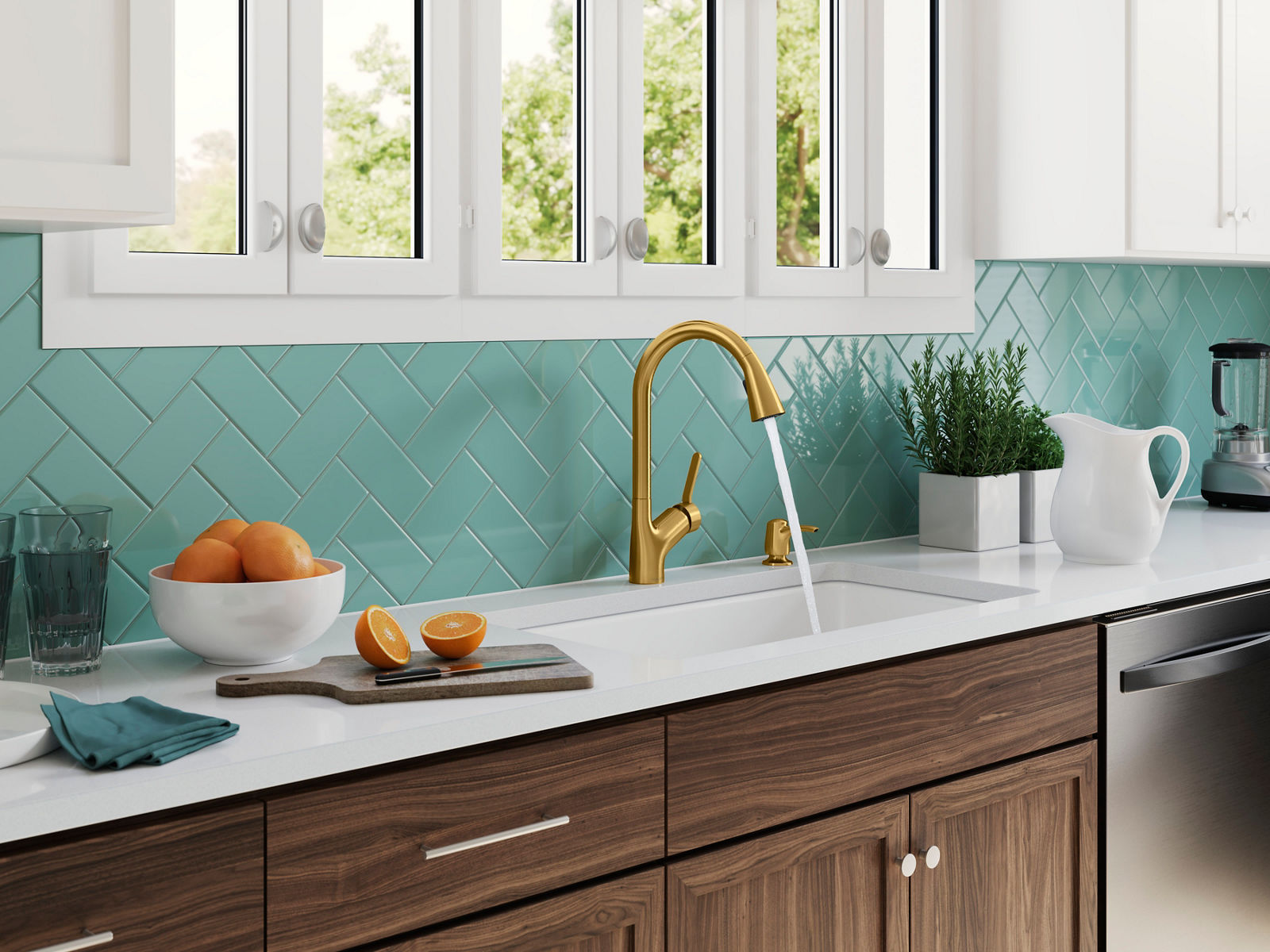 A kitchen counter with a brushed brass faucet pouring water into a white undermount sink with assorted kitchen objects on the counter and a pastel blue tile backsplash.