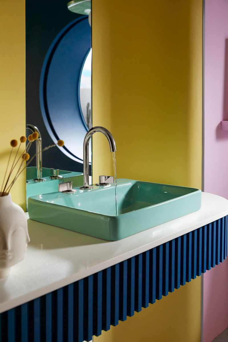 Image of the vanity space in the bathroom designed by Jonathan Adler, featuring the Spring Green Vox vessel sink and Components faucet in Vibrant Polished Nickel.
