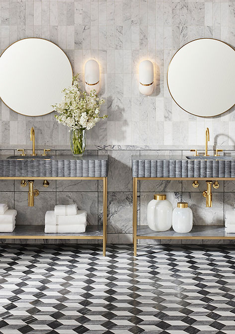 Modern bathroom interior with double vanity and Ann Sacks floor and wall tile.