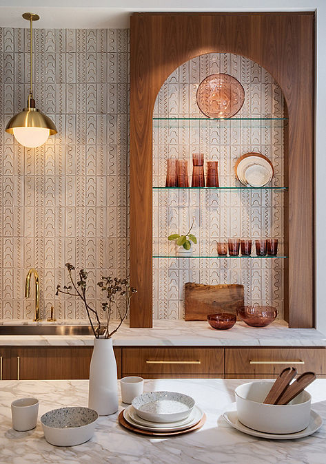 Modern kitchen interior with Ann Sacks wall tile and shelving.
