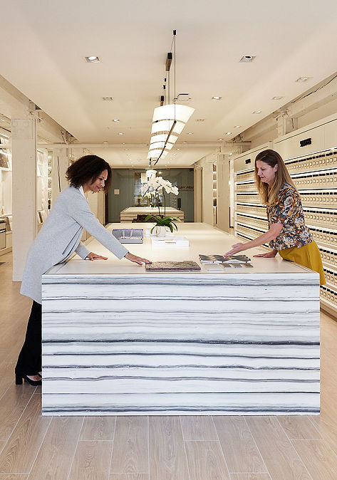 Two Ann Sacks employees designing tile and stone products.