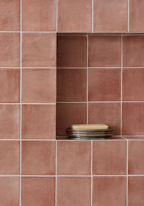 Insert of Ann Sacks tile and stone bath accessories.