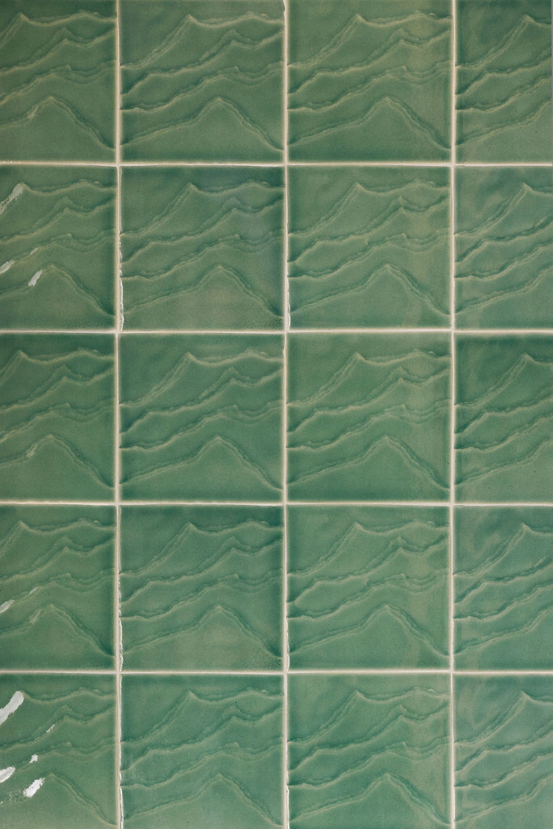 Green tile designed by Daniel Arsham.