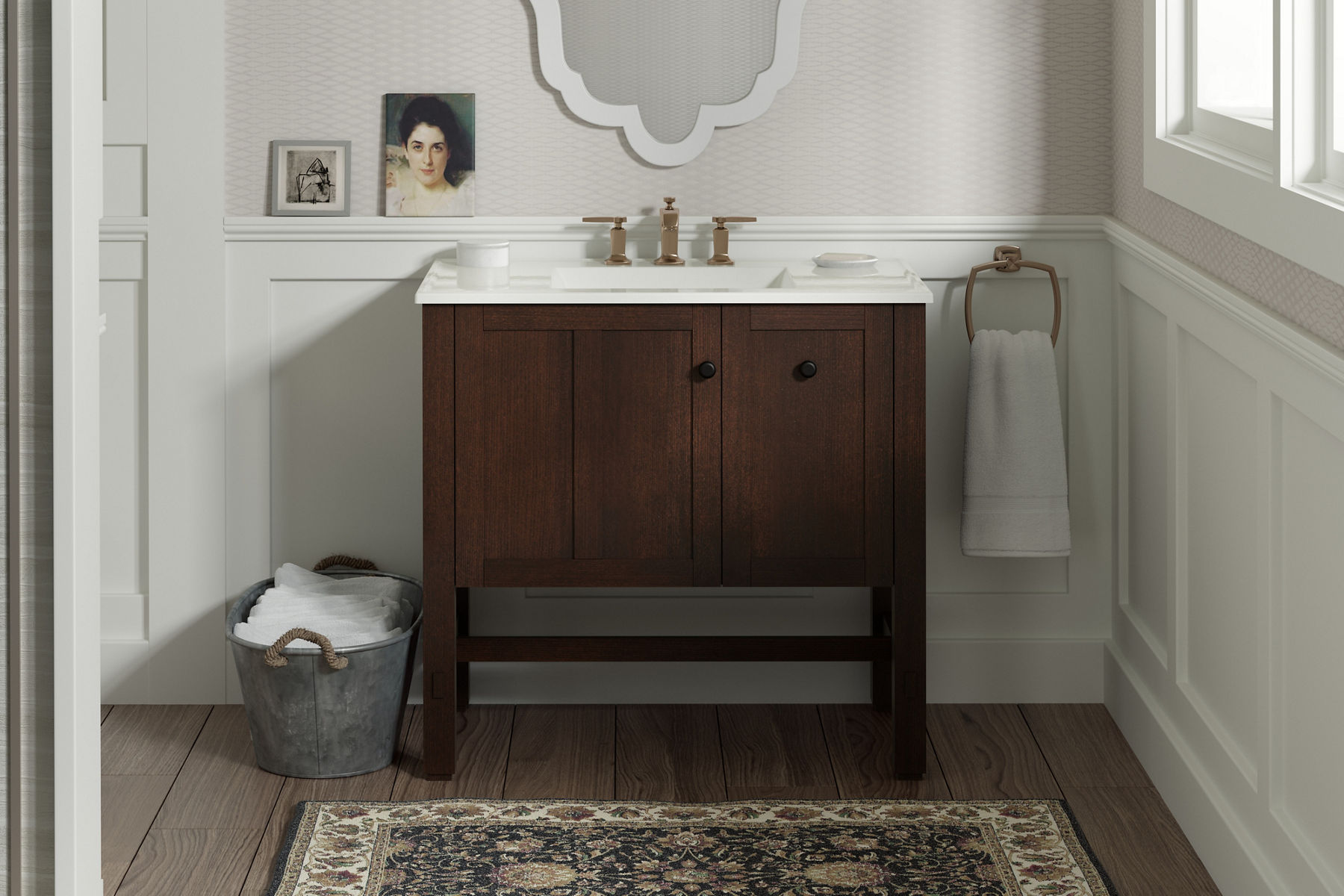 A Tresham vanity in the Woodland colorway with a brushed brass faucet and white counter top set in a traditional bathroom with paneled walls.