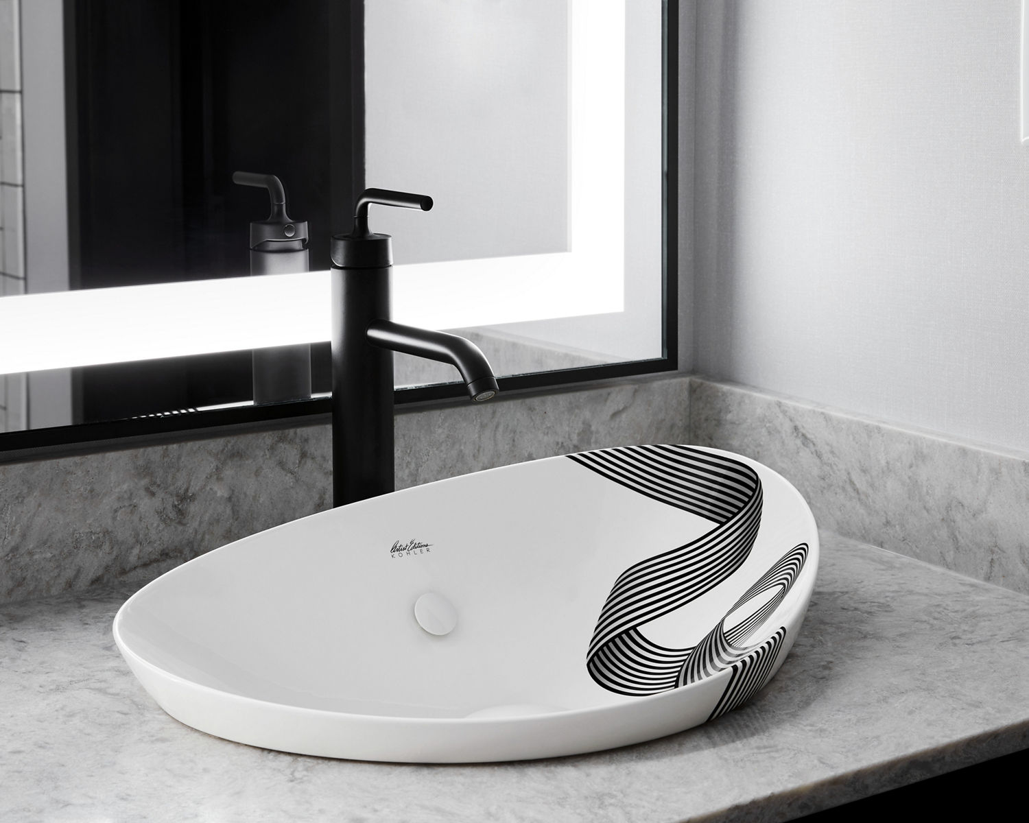 Closeup of The Veil™ sink, showing a custom black-and-white ribbon design which is created using a ceramic ink transfer technique.