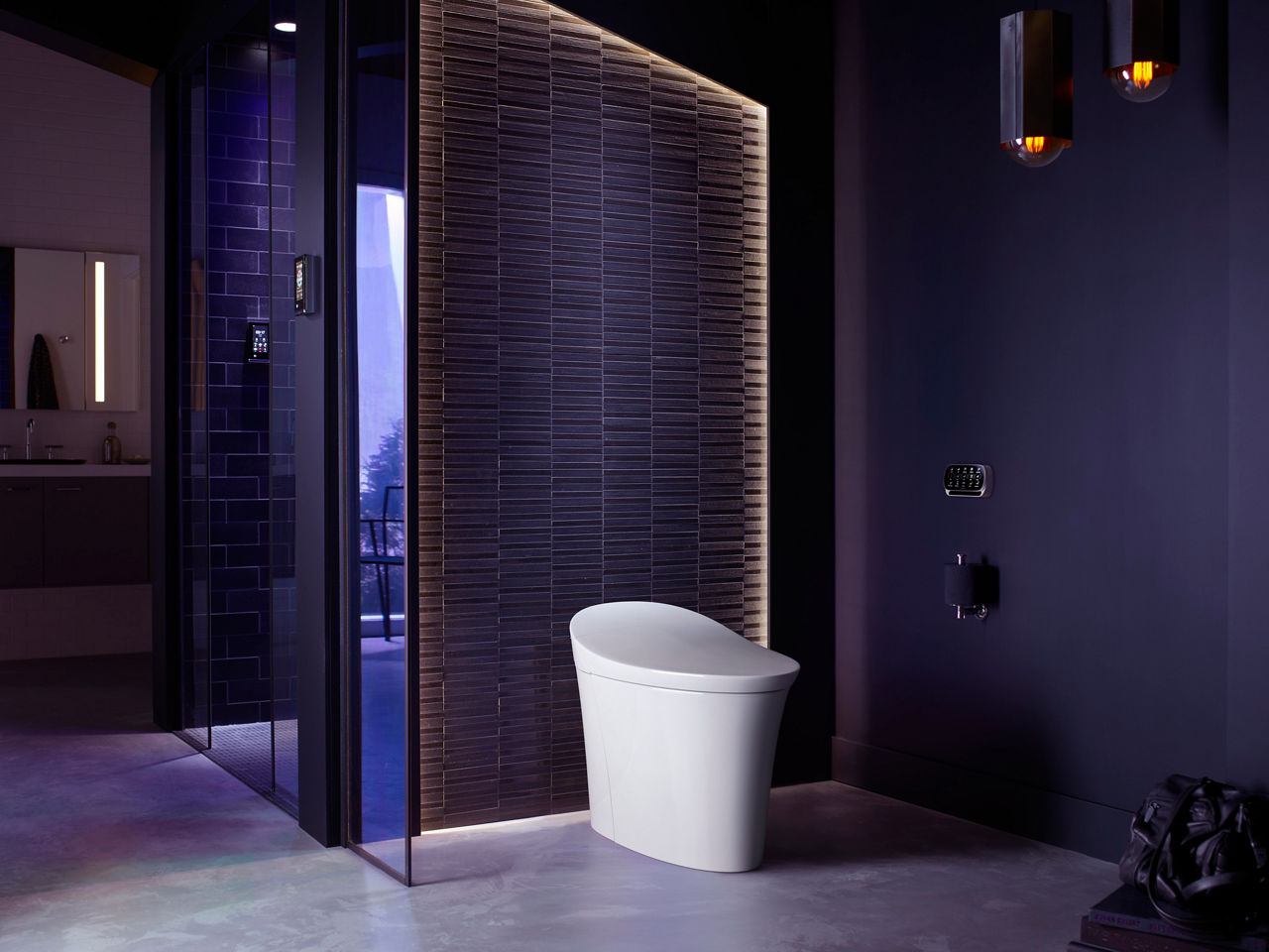 A Veil smart toilet in a bathroom illuminated in a soft purple light.