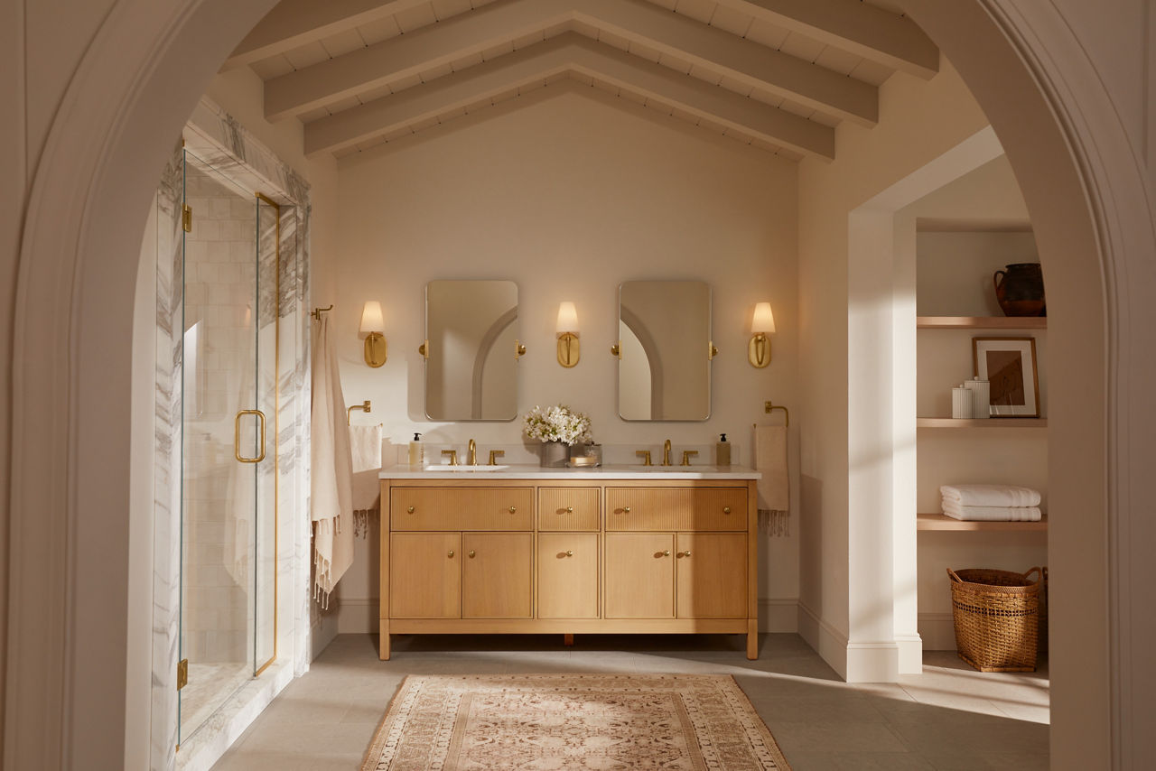 A light wood grain double bathroom vanity designed by Shea McGee.
