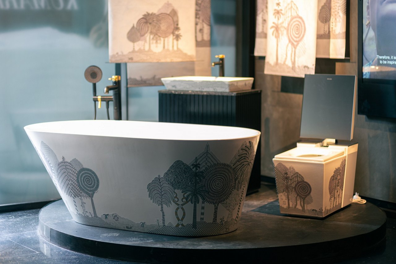 A zoomed in image of a bathtub in a luxurious bathroom space that is inspired by intricate patterns.