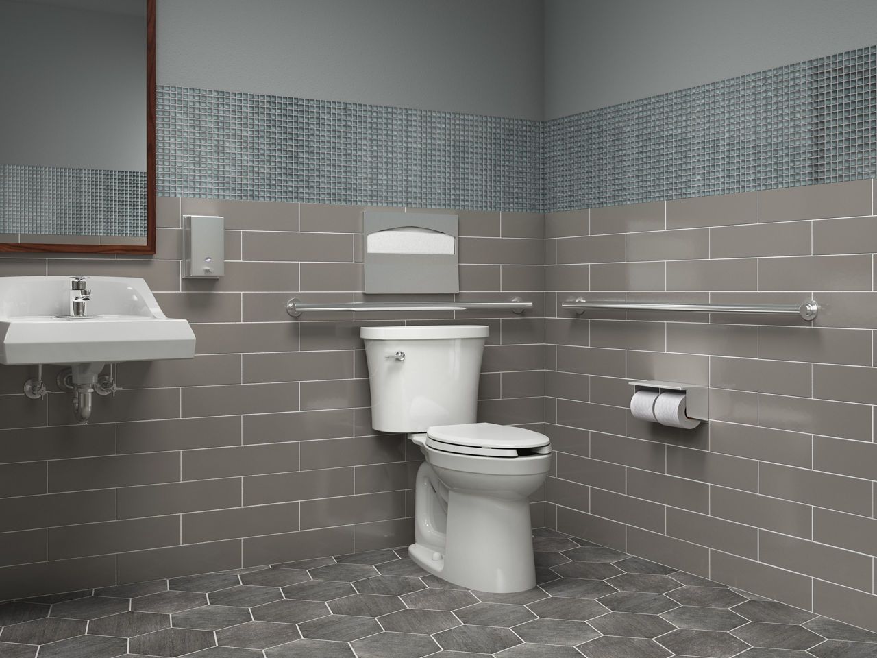 A commercial bathroom with KOHLER Kingston elongated floor-mount toilet and Purist grab bars.