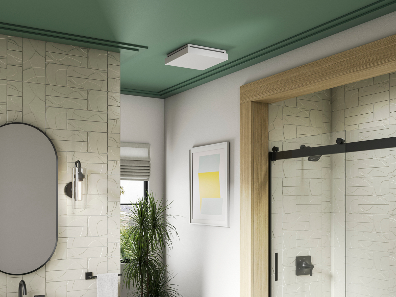 A white Atmo bathroom exhaust fan mounted on a green ceiling.